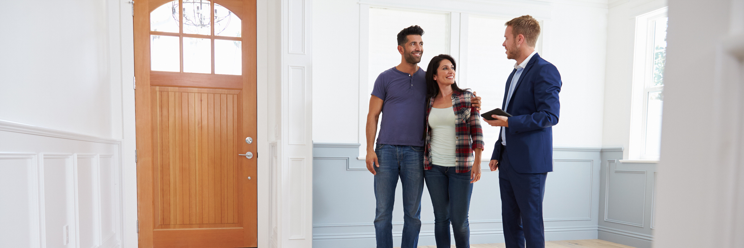 Couple in new house with realtor