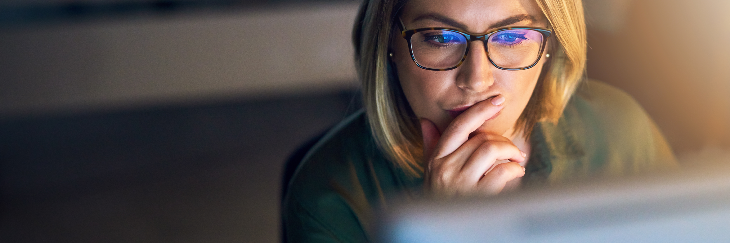 Lady looking at taxes on computer