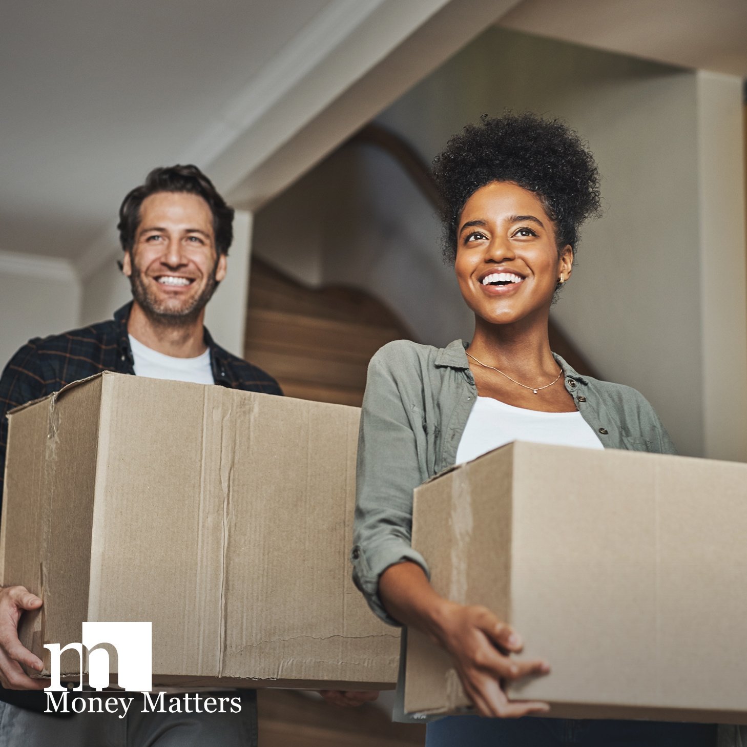 First-time homebuyers unloading boxes