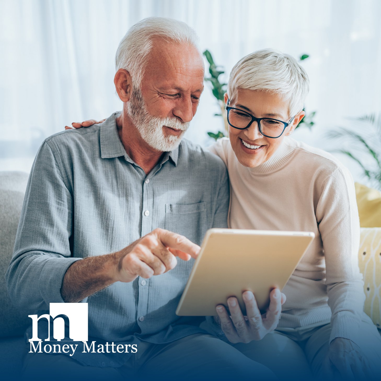 Elderly couple checking finances online