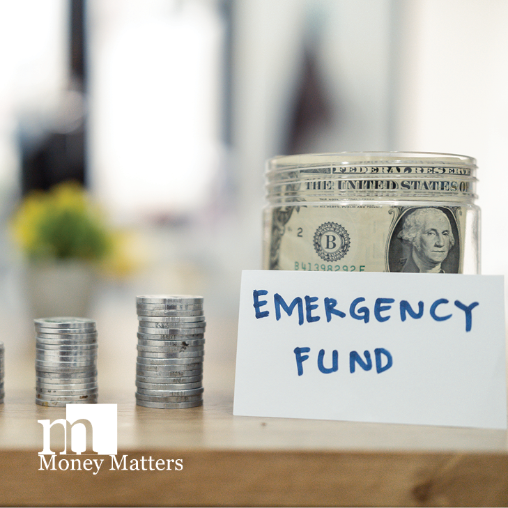 Four stacks of coins, a jar of dollar bills and a sign that reads, Emergency Fund